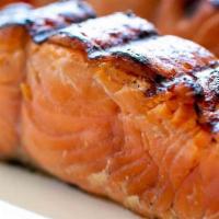 Salmon · Grilled salmon served with rice and salad.