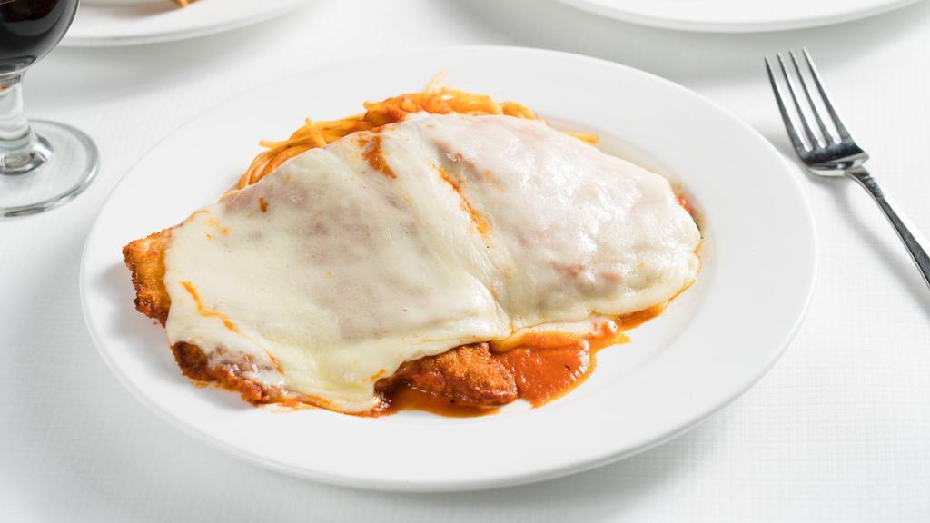 Pollo Parmigiana · Breaded chicken breast, topped with mozzarella and tomato sauce.