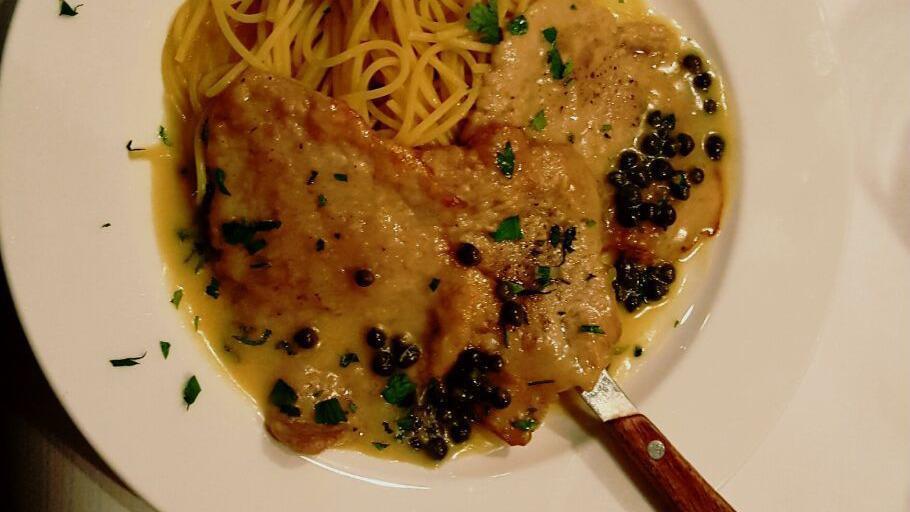 Veal Piccata · Veal scaloppini sautéed with capers in lemon butter sauce.