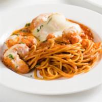 Shrimp Parmigiana · Breaded shrimp topped with mozzarella and tomato sauce.