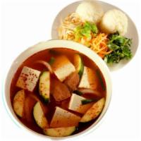 Tofu Soup · Beef soup with Korean hot sauce, spices, vegetables and tofu. Served with two scoops of rice...