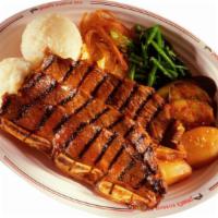 Kalbi Plate · Barbeque shrot ribs in special sauce. Served with two scoop of rice.