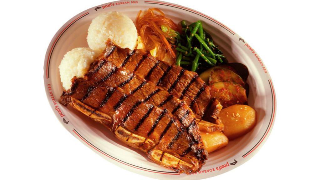 Kalbi Plate · Barbeque shrot ribs in special sauce. Served with two scoop of rice.