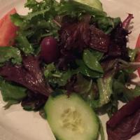 Tri-Color Salad · Arugula, radicchio, and endives and tossed in a house vinaigrette.