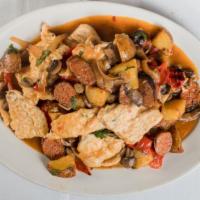 Chicken La Famiglia · On the bone with onions, potatoes, sausage, peppers, and mushrooms.