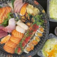 Sushi Sashimi For Two · Sashimi (eighteen pieces),   sushi (ten pieces) with crunchy spicy salmon and moon rive roll.
