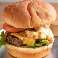 Cheeseburger · Most popular. 5 oz patty. American cheese, grilled onions, pickles, lettuce, tomato and moo ...