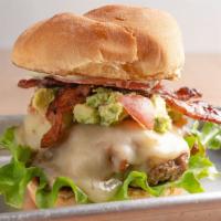 Guac-Zilla Burger · A burger topped with bacon, Pepper Jack cheese, guacamole, lettuce, tomato, and wasabi mayo....
