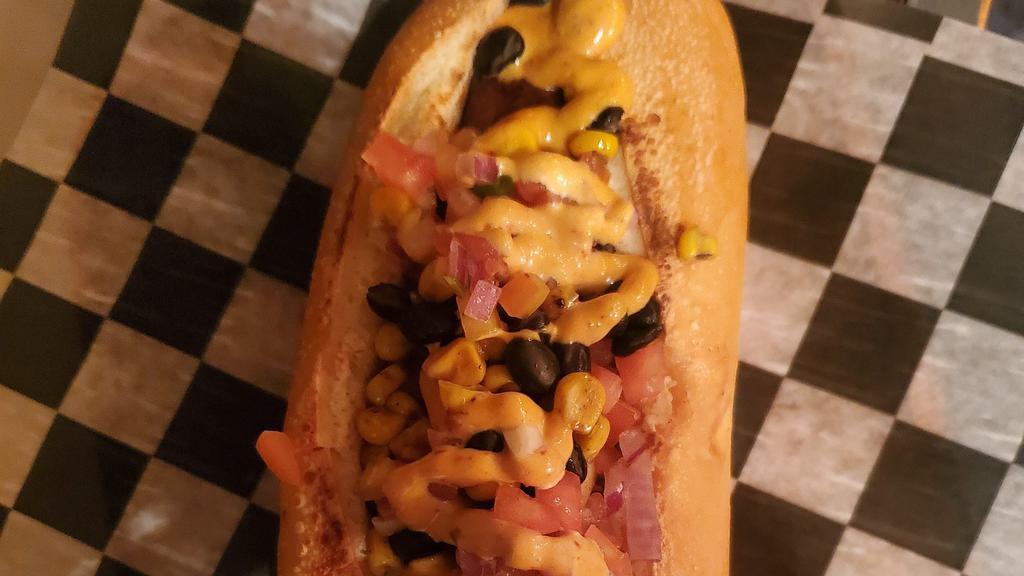 The Gringo · Amazing 1/3 pound smoked Wagyu beef sausage infused with cheddar and jalapeños. Served on a toasted Italian hero with pico de gallo, roasted corn and beans, chipotle mayo and pickled jalapeños on top!