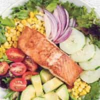 Salmon Con Ensalada · Grilled salmon with salad.