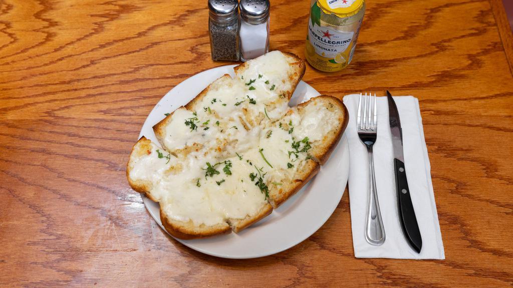 Garlic Bread · Additional charge  for cheese .
