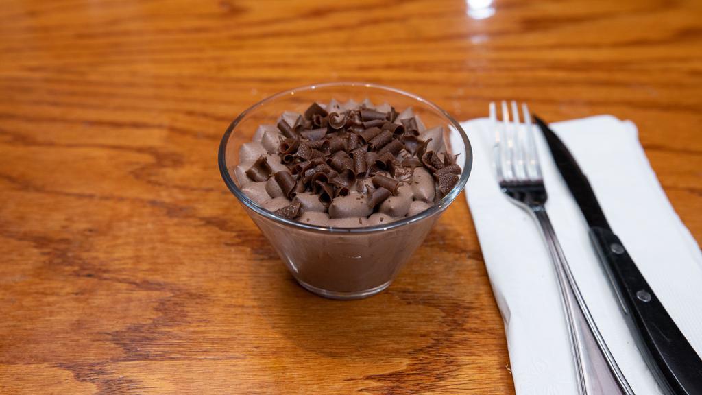 Chocolate Mousse · Rich chocolate mousse and zabaione, topped with chocolate curls