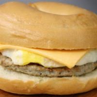 Sausage, Egg, & Cheese Bagel · Scrambled eggs with cheese, a sausage patty, on a bagel.