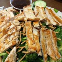 Chinese Chicken Salad · Grilled chicken over romaine lettuce tossed with noodles, assorted vegetables, almonds and s...