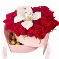 Heart · Fresh roses, with white orchid and 15 candies on box. available box black, white, red