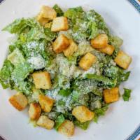 Caesar · Romaine lettuce, grated Parmesan, and homemade croutons with our signature Caesar dressing.