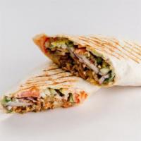 Falafel Gyro · Crispy falafels, hummus, lettuce, tomatoes and onions wrapped in pita bread.