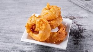 Onion Rings · Fried breaded onion rings served with Empire zesty sauce.