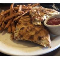Chicken Panini · Roasted peppers, mozzarella, and spicy mayonnaise. And French fries.