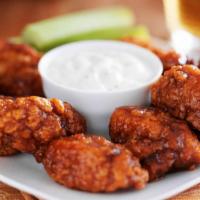 Hot Wings - Boneless · Classic boneless wings fried, topped with High-heat hot sauce, cooked to order and perfectly...