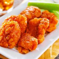 Mild Wings - Boneless · Classic boneless wings fried, topped with Mild hot sauce, cooked to order and perfectly crisp.