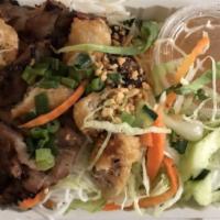 Bún Chả Giò Thịt Heo Nướng · Spring rolls and grilled pork with lettuce on rice vermicelli.