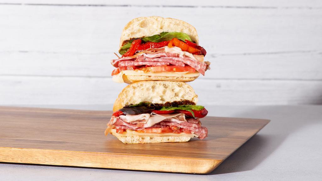 Ultimate Italian · Savory proscuitto, sopressata, and salami with fresh mozzarella, roasted red peppers, mixed greens, and balsamic on your choice of bread.