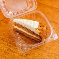 Store Baked Cake · Served Warm on a Saucer Cup Topped with Vanilla Ice Cream Whip Cream on Top.
