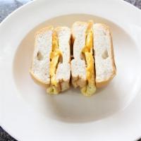Egg And Cheese On A Roll · 2 Eggs with American cheese.