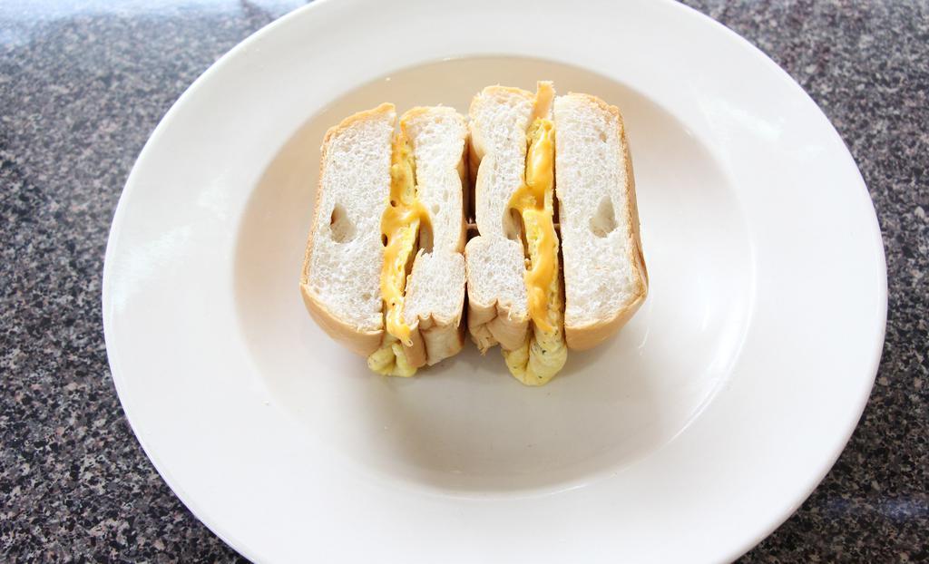 Egg And Cheese On A Roll · 2 Eggs with American cheese.