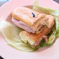 Cuban Sandwich · Pork, ham, Swiss, and pickles.
