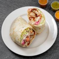 Baja Burrito · baja fish (or other filling) | cabbage | crema | pico de gallo | pickled onion