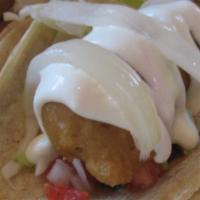 Baja Original Fish Taco · crispy fish | cabbage | crema | pico de gallo | pickled onion