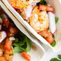 Grilled Shrimp Taco · garlic lime shrimp | cabbage | crema | pico de gallo | pickled onion