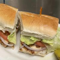 California Grilled Chicken · Lettuce, tomato, raw onion, and mayonnaise on a long roll.