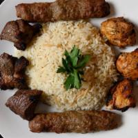 Shish Kabob Platter · One charbroiled beef stick marinated in our special recipe. Served with choice of rice or fr...
