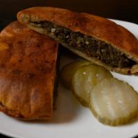 Hawawshi Sandwich · The famous Egyptian dish! Minced beef seasoned with parsley, onion, and green peppers.