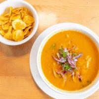 Encebollado Mixto · fresh tuna fish and shrimp, cooked with yuca and latin spices to create a flavorful soup; to...
