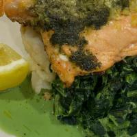 Salmon Not Salman · with pesto butter, roasted garlic, mashed potato and cream spinach