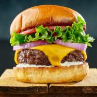 Cheeseburger · Juicy beef patty with your choice of cheese, lettuce, tomato, mayonnaise, and ketchup on a f...