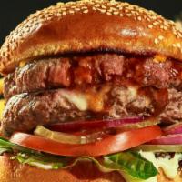 Double Hamburger · Double the flavor: two juicy beef patties with lettuce, tomato, mayo, and ketchup on a fresh...