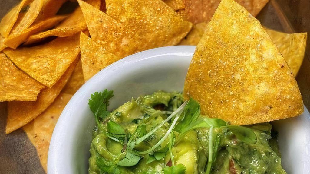 Guac & Chips · Fresh homemade guacamole, tortilla chips.