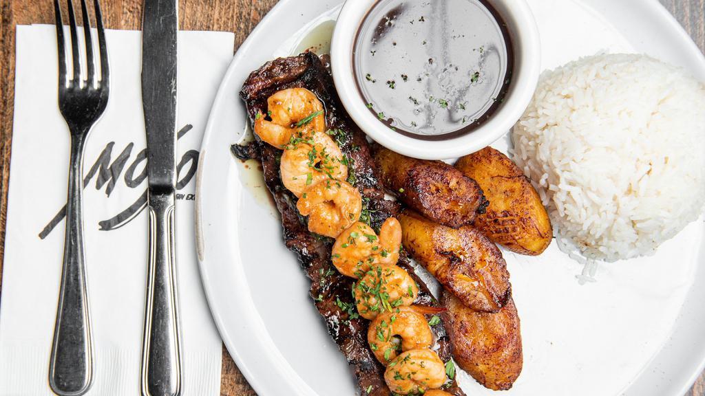 Churrasco Lunch (Ol) · 6oz Grass fed angus grilled skirt steak drizzled with chimichurri sauce served with. garlic rice, black beans and maduros