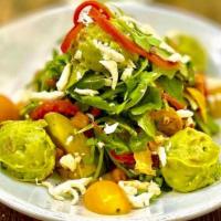 Avocado Flower Salad · Romaine lettuce nest stuffing with avocado, tomato and onion salad, lime vinaigrette
