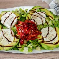 Avocado Salad · Chef selection. Romaine lettuce, avocado, fresh mozzaella, roasted red peppers with homemade...