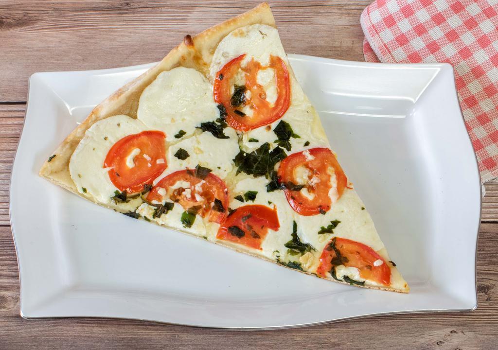 Margherita · With fresh tomato, fresh mozzarella, garlic and basil.