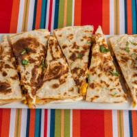 Southwestern Quesadilla · Quesadilla made with filling of your choice, cheese, black beans, corn and pico de gallo . G...