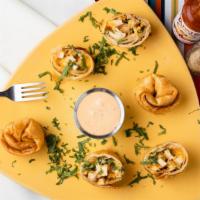 Chipotle Chicken Chingalinga (6 Pc) · Chipotle seasoned chicken and cheese rolled in a flour tortilla and deep fried. Garnished wi...
