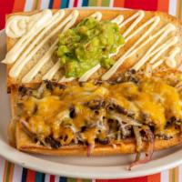 Lc Serrano Melt · Grilled chicken or steak sauteed with serrano chiles, red and white onions and topped with c...