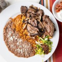 Carne Asada · A traditional plate of grilled, marinated steak and onions, Served with fried potatoes, pico...